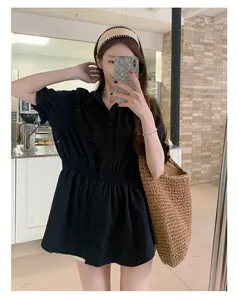 Asian model wearing black shirred waist short sleeve shirt with straw bag for summer