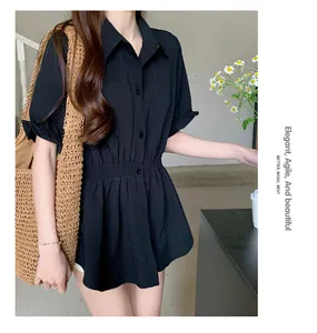 Black short-sleeved shirt for women featuring a slimming cinched waist design.