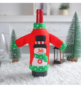 Festive Christmas wine bottle cover featuring a cute snowman design on a red felt sweater