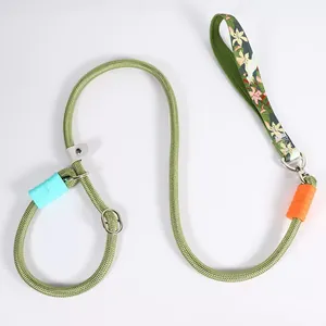 Close-up of durable green rope slip lead dog leash with floral pattern handle