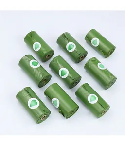 Vista detallada de 9 rollos de bolsas de basura verdes biodegradables para mascotas con logo