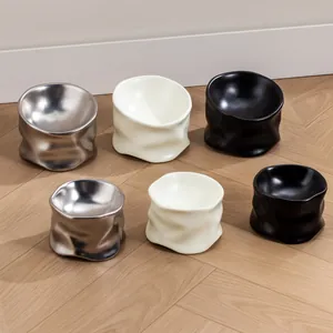 Cuencos modernos de cerámica hechos a mano en colores plata blanco crema y negro mate