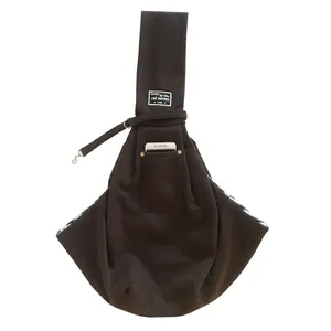 Dark brown pet sling carrier with front pocket for phone and plaid lining