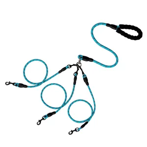 Blue reflective nylon triple dog leash with padded foam handle for walking three dogs.