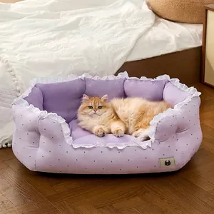 Cozy purple pet bed sofa with elegant lace trim and polka dots for cats and small dogs