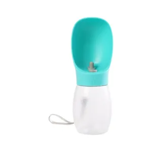 Gourde portable turquoise pour chiens et chats avec réservoir clair et dragonne