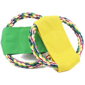 Detail view of colorful braided rope and canvas dog flying disc toys for training