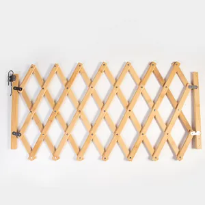 Expandable wooden pet safety gate and foldable isolation fence for home protection