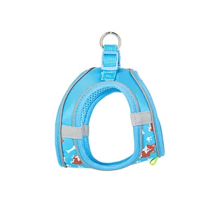 Comfortable blue vest-style pet harness with reflective strips and cartoon dog pattern