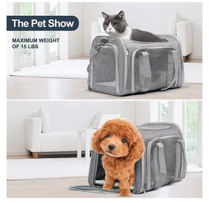 Detail view of breathable gray pet carrier showing cat and dog, maximum weight 15 lbs.
