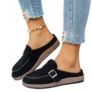 Women's black faux suede closed-toe mules with metal buckle and thick cork sole