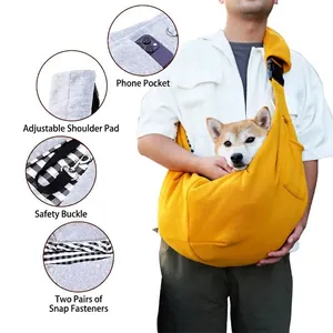 Yellow breathable pet sling carrier with adjustable strap and safety buckle features