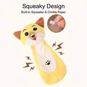 Plush yellow Shiba Inu squeaky dog toy with internal crinkle paper sound design details