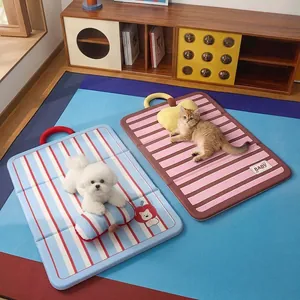 Waterproof striped pet sleeping mats for dogs and cats, available in blue and pink
