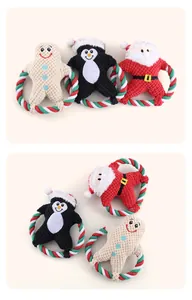Detail view of festive Christmas plush dog toys with durable cotton rope rings