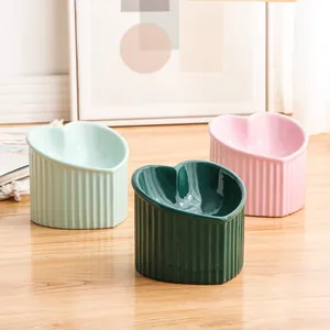Heart-shaped tilted ceramic pet bowl for cats and dogs with anti-tip design