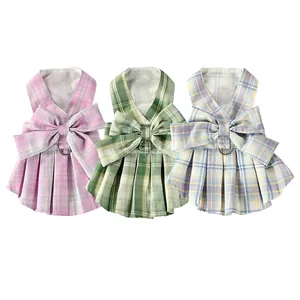Three colors of plaid JK style pet dresses featuring elegant bows and D-rings for leash