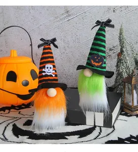 Pair of Halloween gnome plush decorations with striped wizard hats and long beards