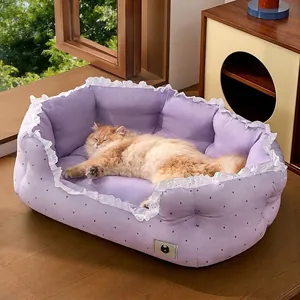 Soft purple pet sofa bed with lace trim and polka dots for cats and small dogs