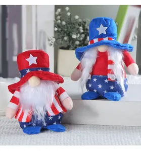 Detailed view of two patriotic Fourth of July gnomes with American flag star patterns