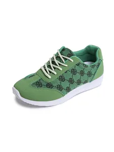 Vue latérale de baskets légères vertes pour femmes avec motif floral rétro élégant