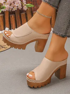 Women's platform mule sandals with chunky wood-grain block heel and open-toe design