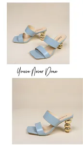 Seitenansicht hellblauer Sandalen mit einzigartigem goldfarbenem Perlenabsatz.