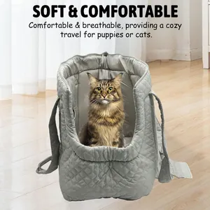 Detail view of a gray quilted pet carrier bag featuring a soft and cozy interior