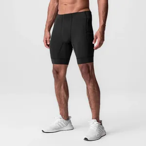Athletic men's quick-dry compression shorts for running and gym workouts in black