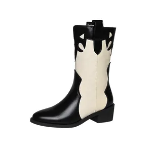 Botas vaqueras occidentales retro para mujer con retazos en contraste blanco y negro y tacón