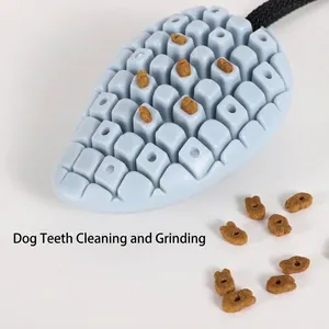 Durable blue mango-shaped dog chew toy with dental cleaning nubs and rope