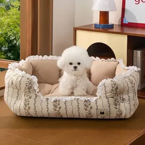 Cozy floral print pet sofa bed with elegant lace trim for small dogs and cats