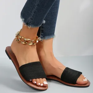 Sandalias planas casuales de punto negro para mujer con un elegante diseño de punta redonda