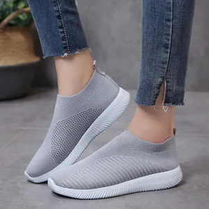 Comfortable breathable grey knit sock sneakers for women with lightweight white soles