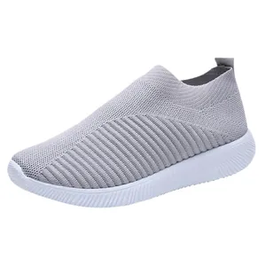 Lightweight grey fly-knit sock sneakers for women with a comfortable elastic upper and white sole