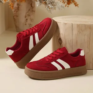 Vintage red suede GAT sneakers with chunky rubber platform soles and side stripes
