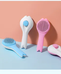 Close-up of pet self-cleaning slicker brushes with fish tail handles in various colors.