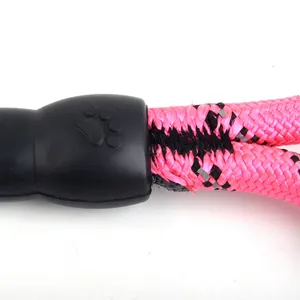 High-quality pink reflective rope dog leash featuring a durable black paw print connector