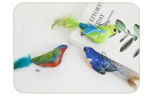 Detailed view of three colorful plush chirping bird toy figures for cats with feathers