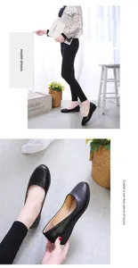 Close-up detail of minimalist black soft leather flat shoes with round toe design.