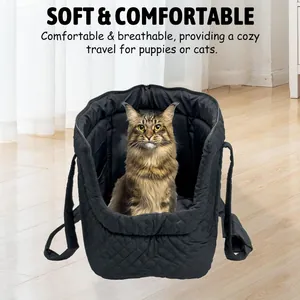 Black quilted pet carrier bag with a soft interior, featuring a cozy cat for travel comfort