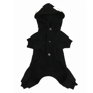 Detail of black pet hoodie with white skeleton pattern on the hood for Halloween