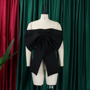 Elegante top a fascia nero con grande fiocco per donna, design sexy con spalle scoperte.