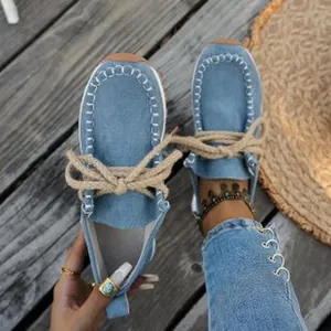 Bohemian blue suede loafers with thick hemp rope bow and white stitching details