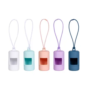 Close-up of five colorful silicone dog waste bag dispensers with matching lanyards