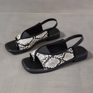 Elegant square toe slingback sandals featuring a chic snake skin pattern design for summer.