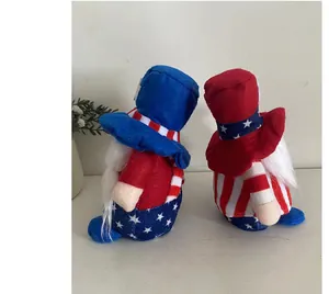 Pair of patriotic 4th of July gnomes with American flag star and stripe patterns decor.