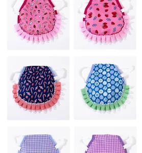 Detailed view of assorted colorful chicken saddles for hen feather back protection