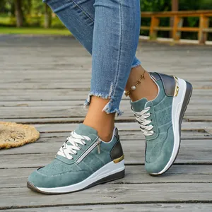 Baskets compensées pour femmes en bleu canard avec fermeture éclair latérale et lacets