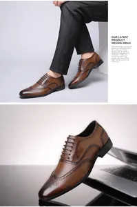Macro view of brown leather men's Brogue dress shoes showcasing intricate wingtip engravings